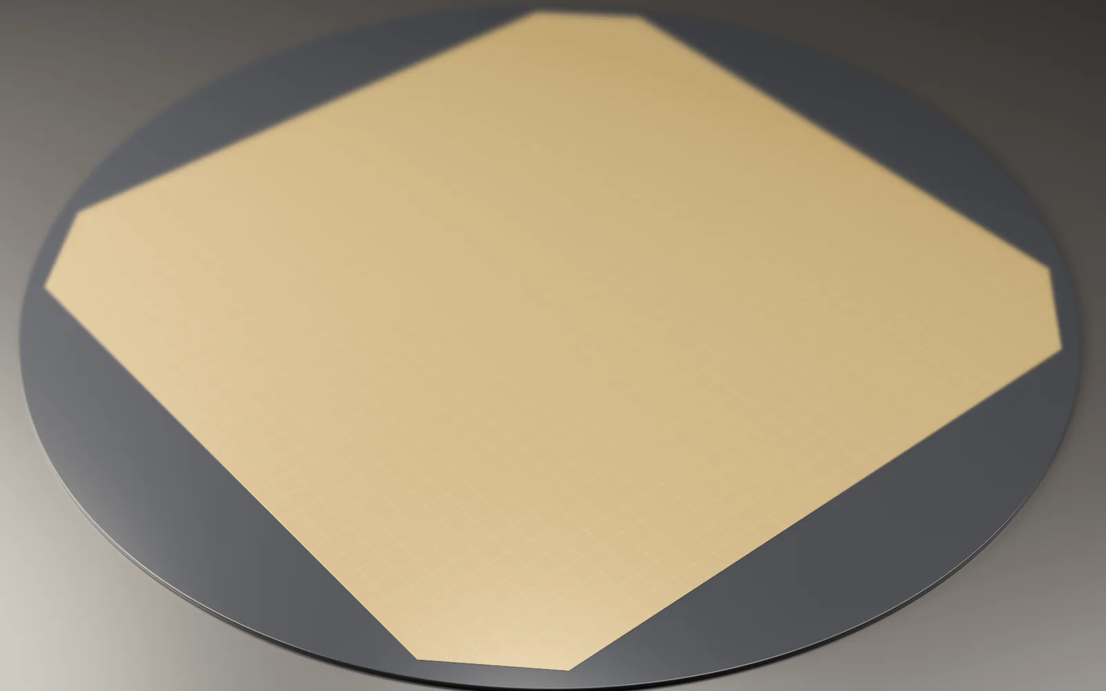Rendered wafer-scale integrated circuit with a pale gold rectangular chip field on a dark circular substrate.