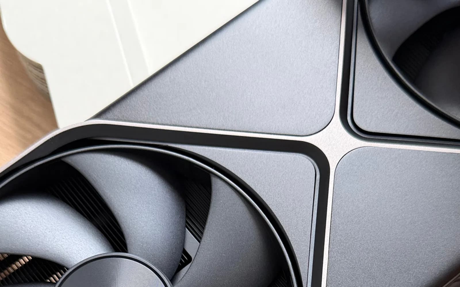 Close-up of a high-performance graphics processor cooling fan and circuit board.